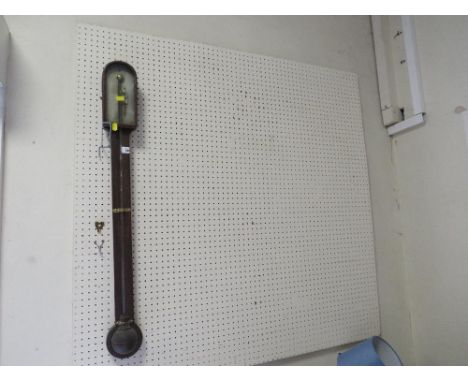 A vintage stick style barometer 