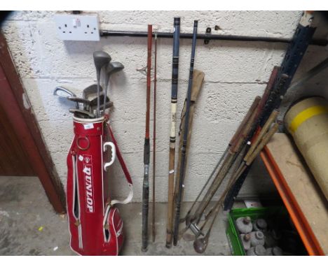 A set of golf clubs and vintage fishing rods 
