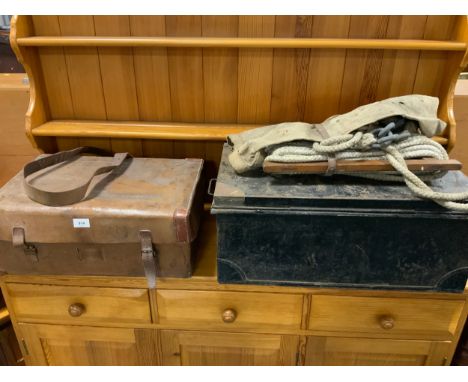 A vintage leather covered tin trunk addressed to M Lambart together with another tin trunk etc. 