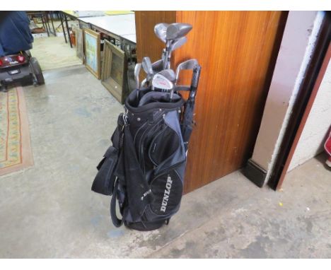A set of golf clubs to include Dunlop and vintage clubs 