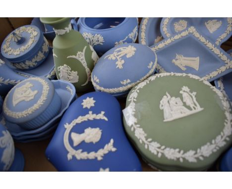 A collection of Wedgwood Jasperware to include vases, bud vases, lidded pots, trinket trays and pin dishes in colours blue, s