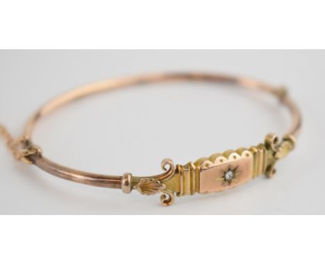 9ct gold bangle, central diamond, complete with safety chain, 6.5 grams.  
