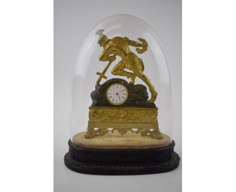 19th century continental gilt metal mantle clock of a soldier falling onto his own sword, on ebonised wooden base, under oval