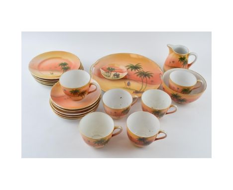 Noritake tea ware in an Eastern desert pattern to include cups, saucers, side plates and others.  In good condition, some sur