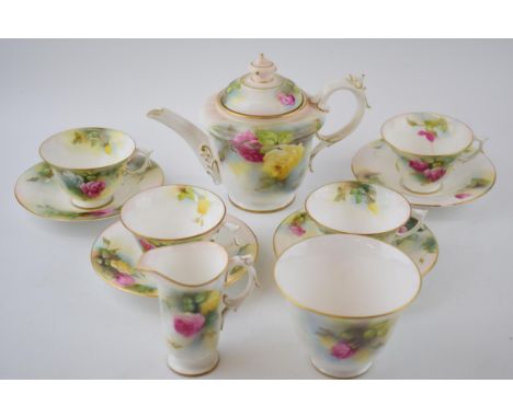 Royal Worcester part tea set decorated with Roses to include a teapot, 4 cups, 4 saucers, a milk jug and a sugar bowl (Qty). 