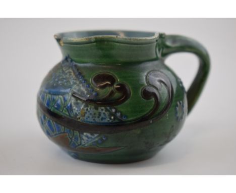 C H Brannam pottery jug in the form of a fish, Arts and Crafts style (af to rim), 10cm wide.  
