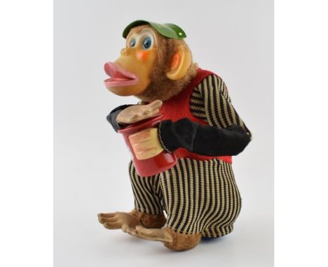 Vintage Battery operated Cragstan 'Crap Shooting Monkey' Made in Japan and retailed in U.S.A by Cragstan. Height 18cm.  Gener
