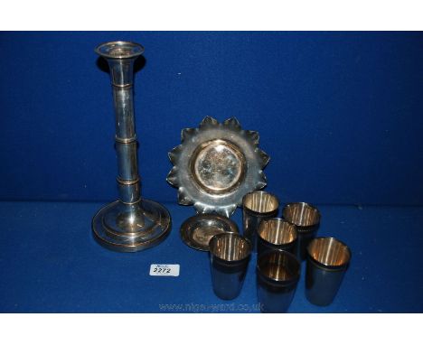 An old Telescopic silver plated Candlestick, two plated stands and six plated Stirrup Cups.