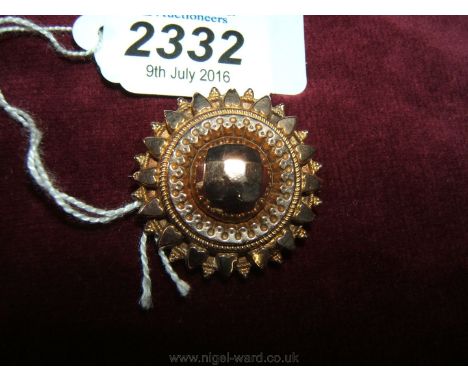 A Victorian Gold cushion style Brooch with aperture for a photograph, 7 grams.