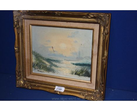 A gilt framed Print of sand dunes