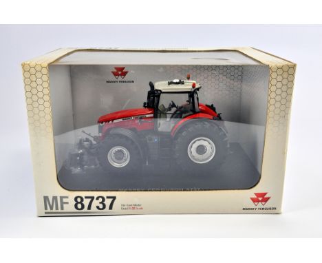 Universal Hobbies 1/32 Massey Ferguson 8737 Tractor. M in Box (Some light smoke related staining to box). 