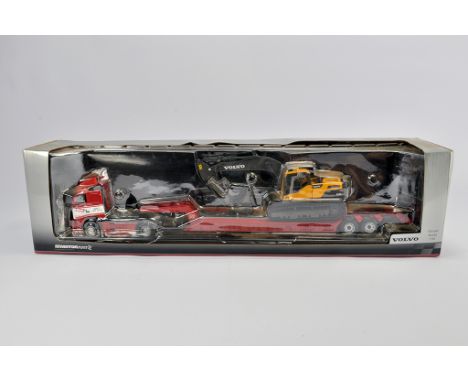 Motorart 1/50 Truck, Low Loader and Volvo Excavator Set. M in Box (Some light smoke related staining to box). 