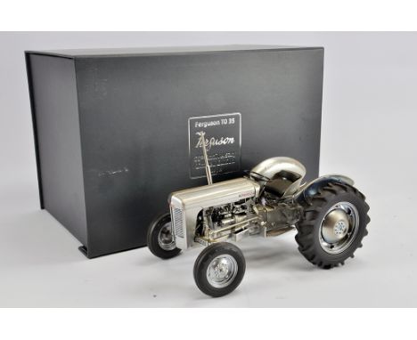 Universal Hobbies 1/16 Ferguson TO35 Tractor. Special Edition. G to E in Box. Would benefit from a clean. 