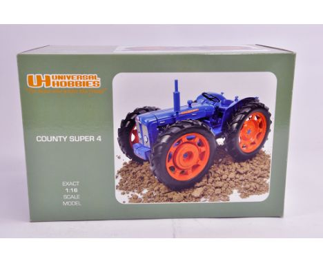Universal Hobbies 1/16 County Super 4 Tractor. VG to E in Box (Some light smoke related staining to box). 