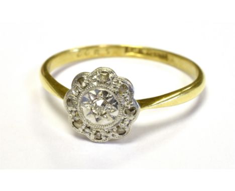 ART DECO 18CT GOLD PLATINUM AND DIAMOND PLAQUE RING (DAISY SHAPED) The small platinum plaque set with diamond accents.PLaque 