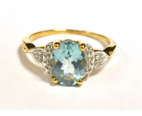 10KT GOLD AQUAMARINE COCKTAIL RING The ring set with a blue faceted oval aquamarine. Measuring 8 x 6mm approx with tapered wh