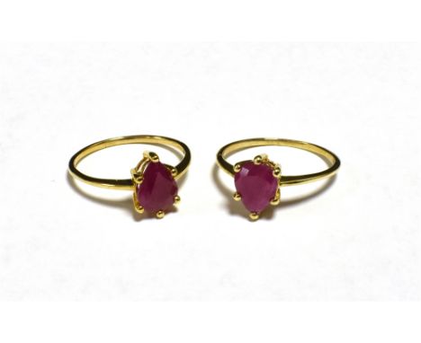 TWO HOT PINK STONE SET RINGS The rings both set with pear shaped stones, shade varied, both measuring approx 7 x 5mm (at wide