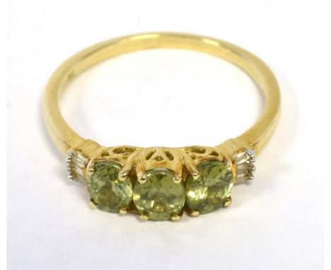 9K GREEN GARNET THREE STONE DRESS RNG ring size P1/2, weight 2g approx