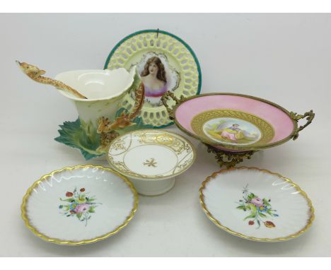 A Franz Porcelain cup, saucer and spoon, the handle and spoon in the form of two giraffes, a Noritake footed dish, a pair of 