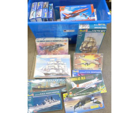 A collection of over twenty model kits including Revell H.M.S. Victory, Tamiya, etc., contents unchecked