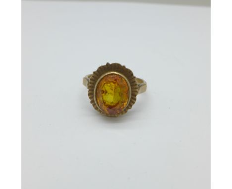 A 9ct gold and orange stone ring, 3.8g, K