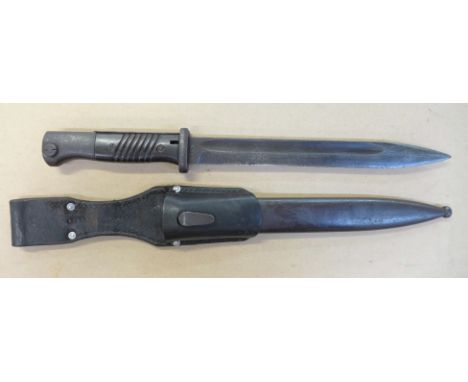 A German model bayonet and scabbard, frog 1898, manufactured by Alexander Copel, Solingen 1942, bayonet and scabbard having m