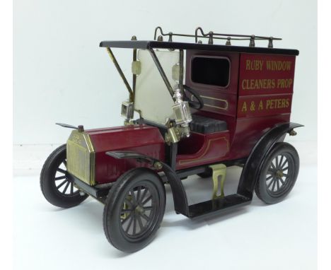 A tin-plate model vintage car