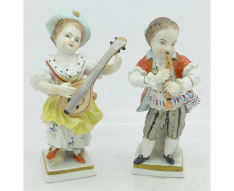 Two continental figures, boy playing the clarinet and girl playing a mandolin, Sitzendorf and Neapolitan marks, 11cm