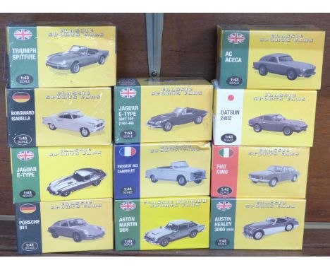 A collection of eleven Atlas 1:43 scale model Classic Sports Cars, all boxed, some sealed