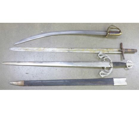 An Indian sword with crest, a sword with leather scabbard and one other sword, possibly North African