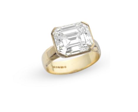 DIAMOND SINGLE-STONE RING, 1995The step-cut diamond, weighing 8.71 carats, in a bicoloured 18 carat gold collet setting, UK h