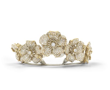 FLOWERHEAD DIAMOND BROOCH/TIARA COMBINATION, CIRCA 1965Each stylised flowerhead with unfurling petals, pavé-set with brillian