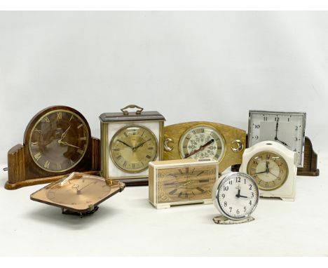 A collection of vintage mantle clocks. Smiths, Metamec, Slava etc. 