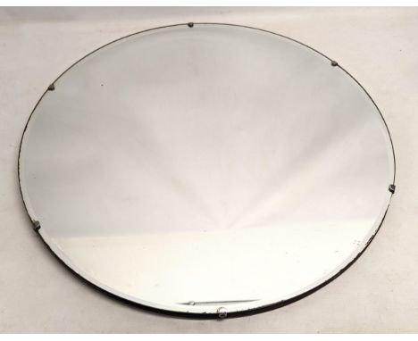 A 1930s Art Deco bevelled mirror. 61cm