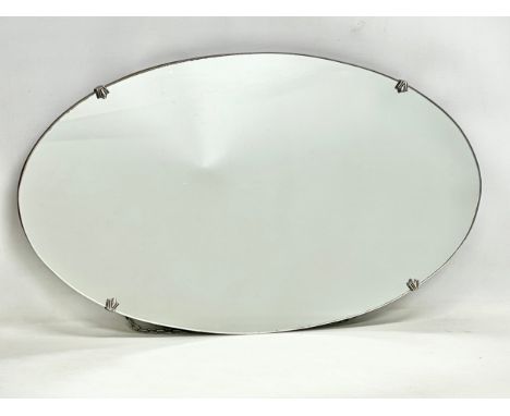 A 1930’s Art Deco mirror. 65.5x38cm 