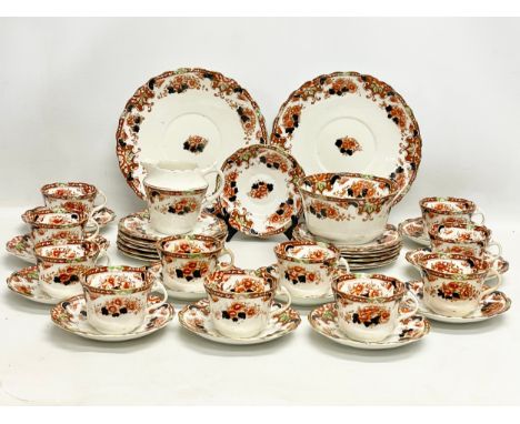 A 39 piece Royal Albert China tea set. Early 20th century, 1917-1927. Pair of dinner plates, milk jug, sugar bowl, 11 tea cup