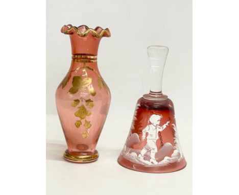 A vintage Mary Gregory Ruby Glass bell and a vintage vase. 