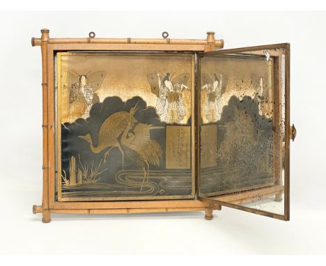 A late 19th century Brevete bamboo framed Japanese style Triptych mirror. 33x33cm closed. 