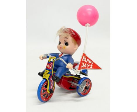 A vintage MTU tinplate windup ‘Boys Tricycle’ made in Korea. 12x15cm 