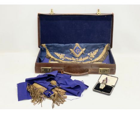 A vintage Scottish Master Masonic apron, sash and medal in original leather case. 