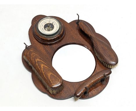 An early 20th century wall hanging barometer vanity mirror. 33x41cm 