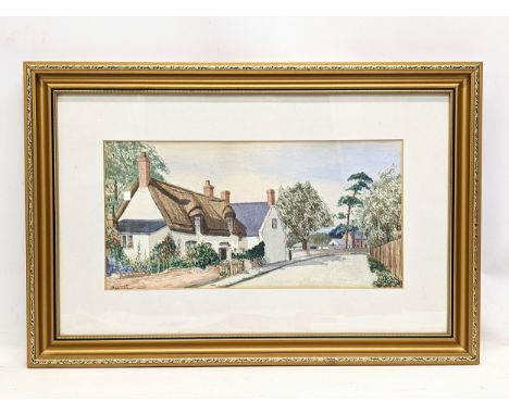 A framed R. Munn watercolour painting. 57x38.5cm with frame, 38x19.5cm without frame 