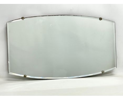A 1930’s Art Deco bevelled mirror. 66x38cm 
