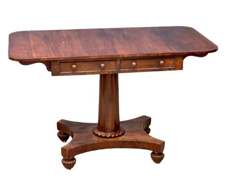 A good quality William IV mahogany double sided sofa table with 2 drawers and 2 dummy drawers. Circa 1830. 122.5x68x75cm 