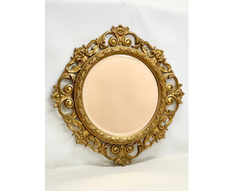 A large vintage ornate gilt framed mirror 86x87cm 