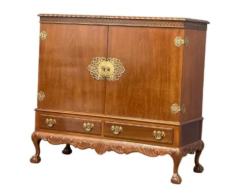 A vintage Chippendale Revival brass bound mahogany linen cupboard. 121x53x113cm 