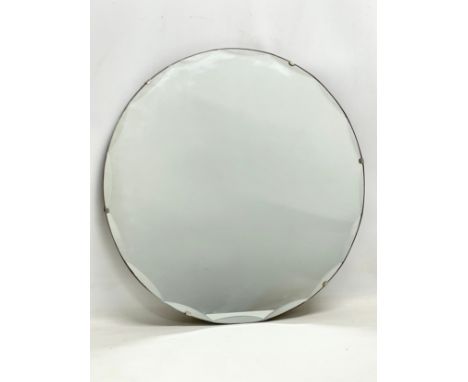 A 1930’s Art Deco bevelled mirror. 50.5cm 