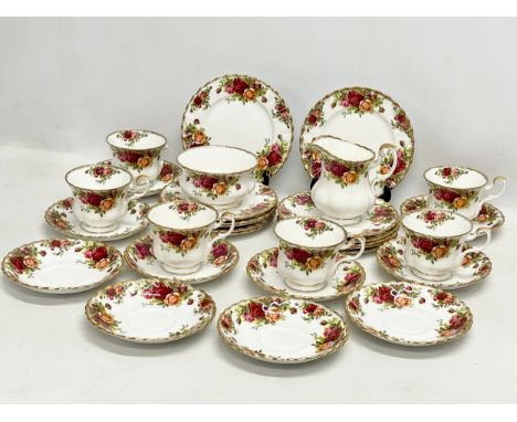 A 30 piece Royal Albert Old Country Roses tea set. 12 sandwich plates, 10 saucers and 6 cups. 