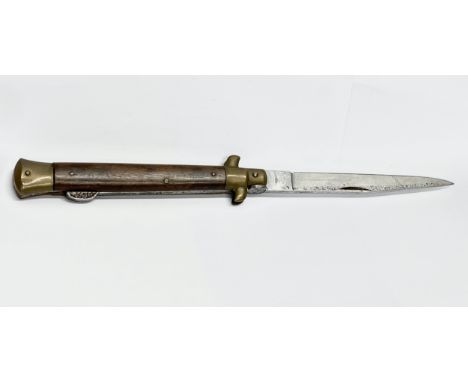 A vintage Italian switchblade by Whitby. 28cm open. 