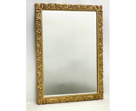 A vintage ornate gilt framed mirror. 51.5x71.5cm 